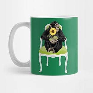 Chimp in a chair with a sunflower Mug